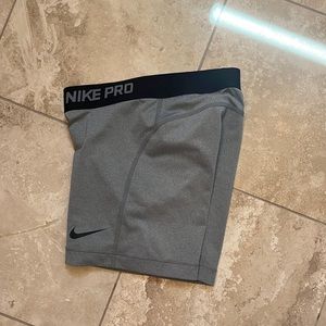 grey nike pros size xs
